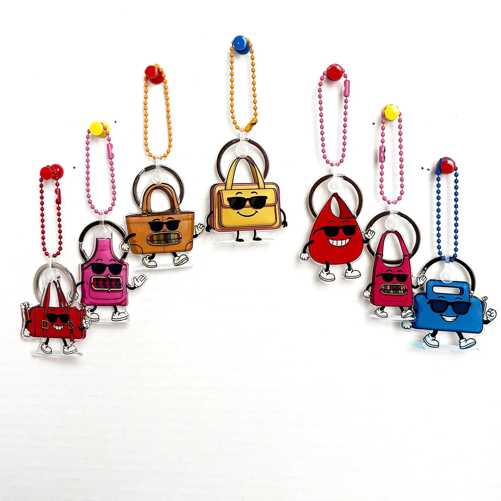 Charmlingz collection 2: Colorful keychain bag charms on a white background