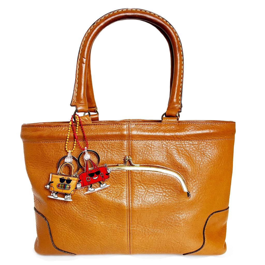 Chunky T cartoon handbag  keychain bag charm with sunglasses and a multicolored mouth  with RFD decorative charms on vintage handbag