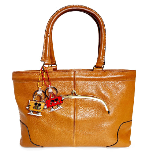 Chunky T cartoon handbag  keychain bag charm with sunglasses and a multicolored mouth  with RFD decorative charms on vintage handbag