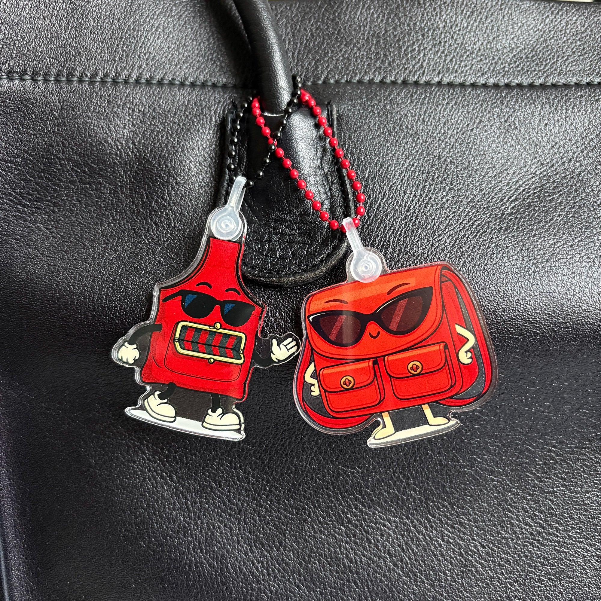 Charmlingz Slingy Red bag charm key ring with Charmmlingz Posty close up