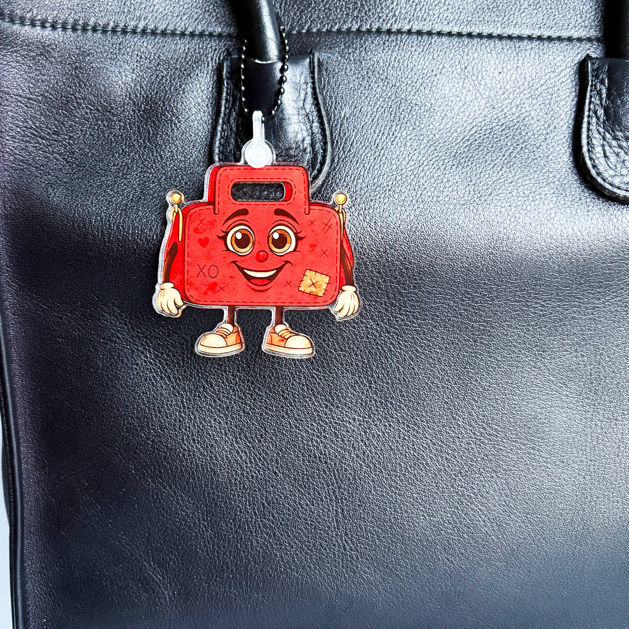 Close up of ReLuvable Gemini on black tote bag