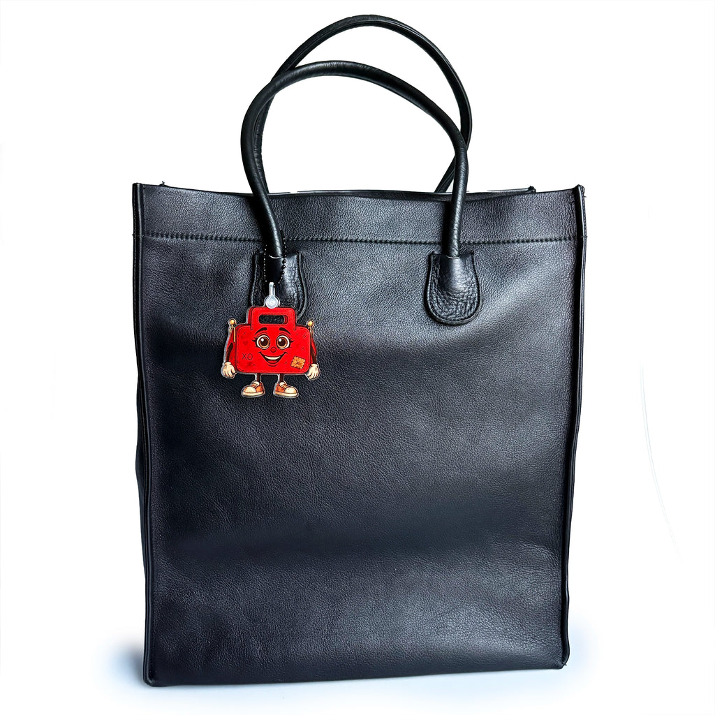 ReLuvable Gemini Bag Charm on vintage tote bag