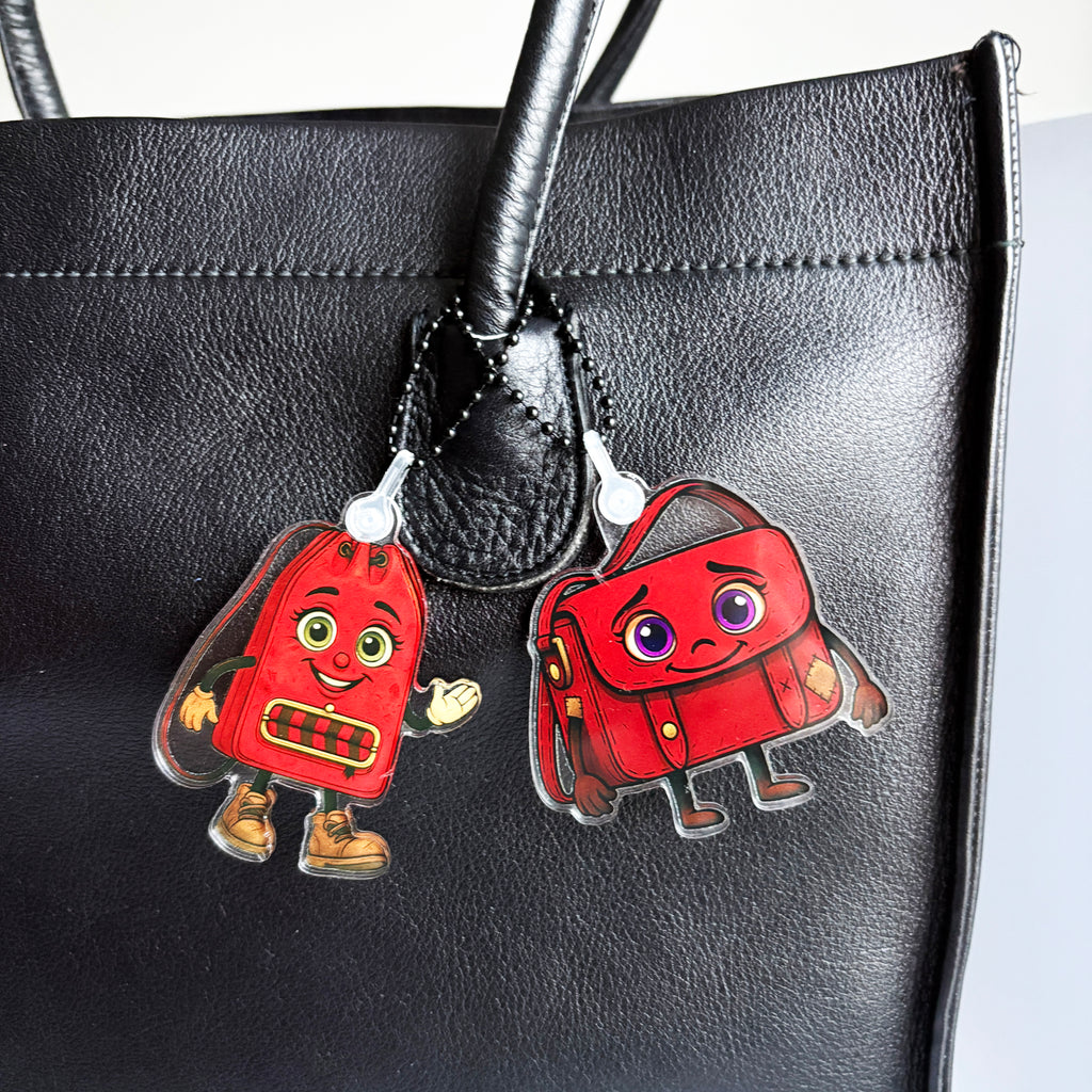 ReLuvable Musey and Duffy close up on black vintage tote bag