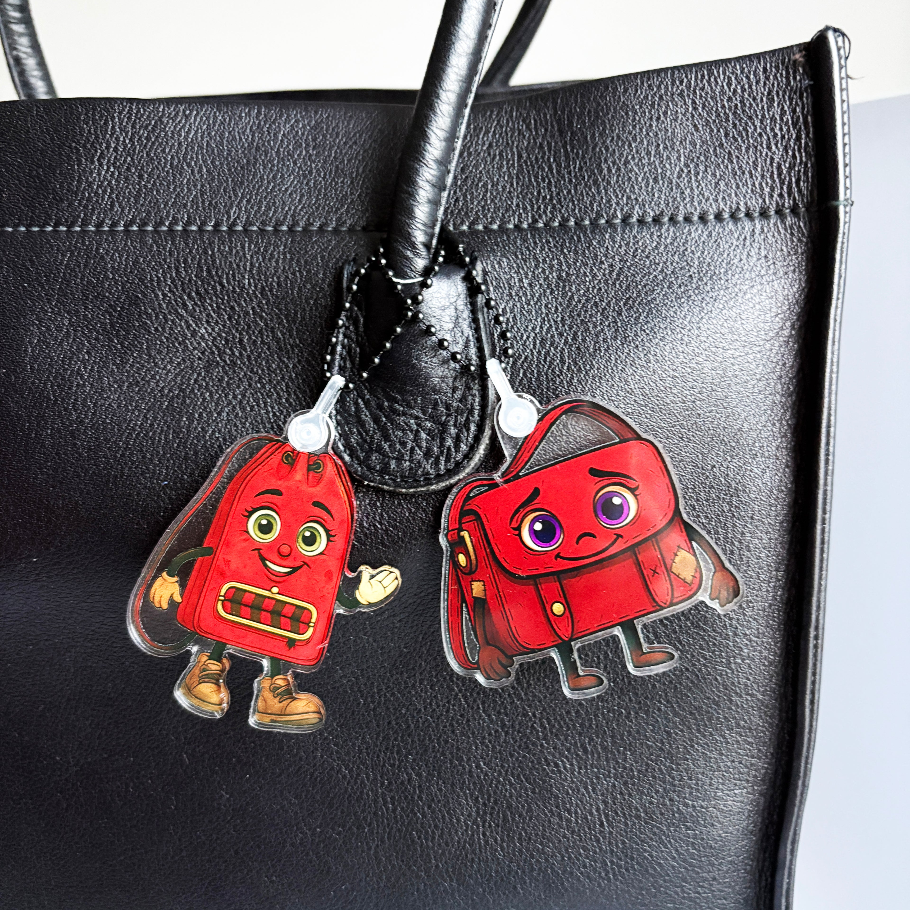 ReLuvable Musey and Duffy close up on black vintage tote bag